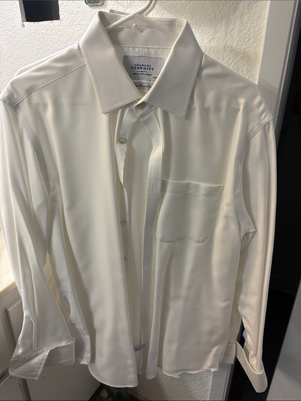 Charles Tyrwhitt Off-White Textured Spread Collar Dress Shirt
Two shirts